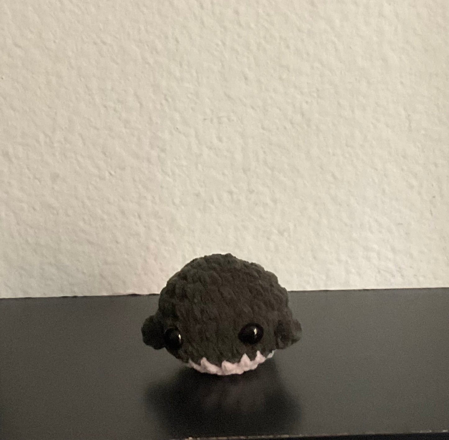 Dark green whale