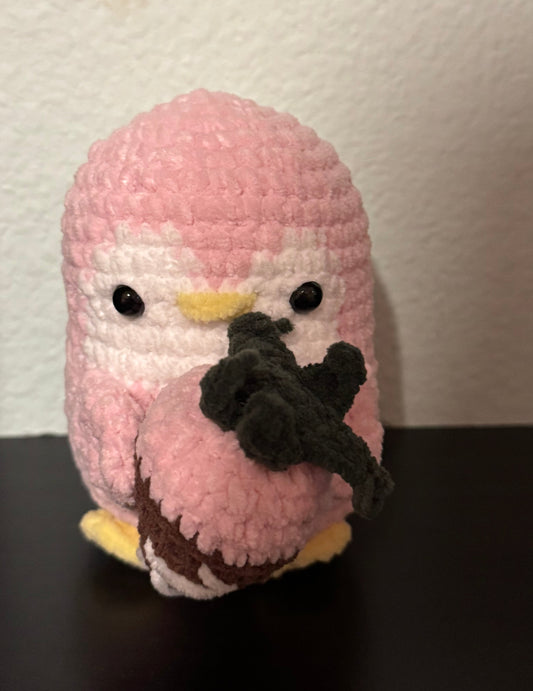 Penguin with a chocolate covered strawberry