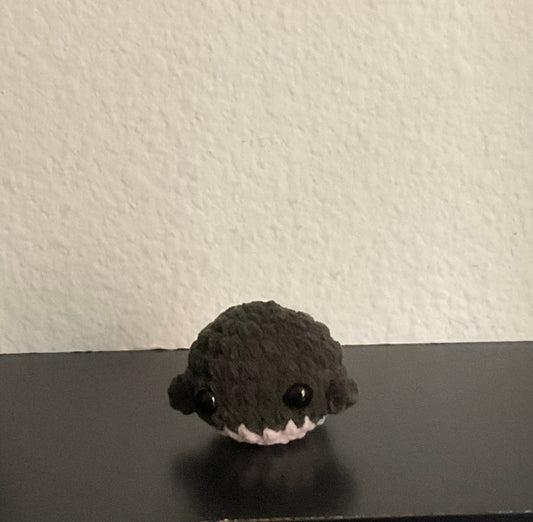 Dark green whale
